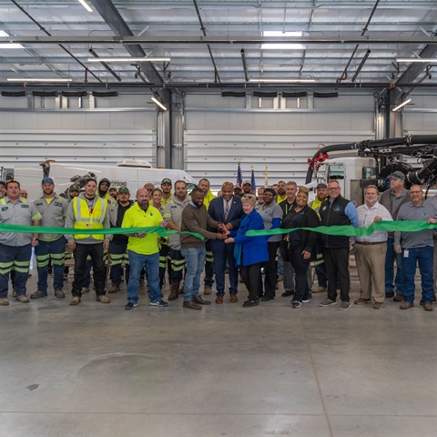 A ribbon cutting at the new Environmental Services Campus